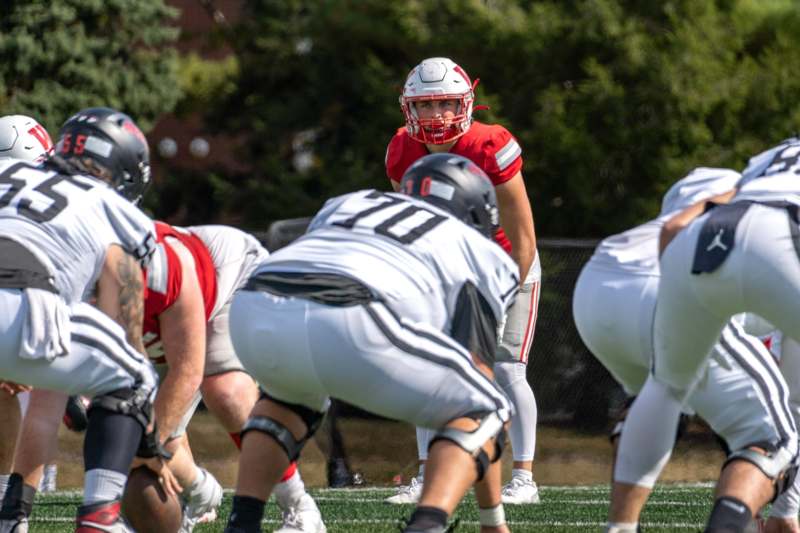 a group of football players on a field
