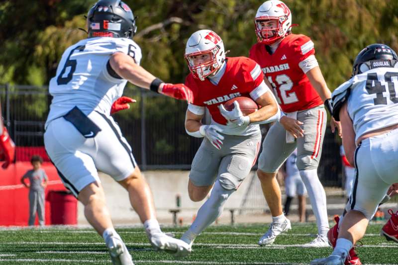 a group of people playing football