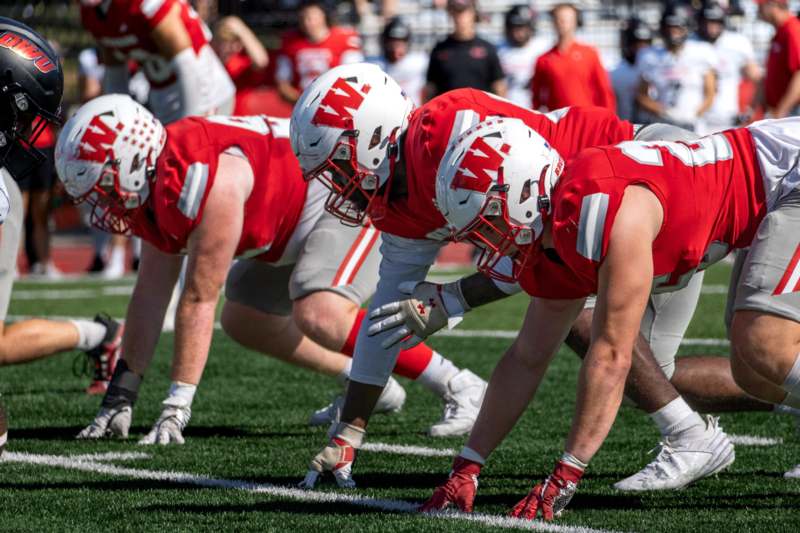 a group of football players on a field