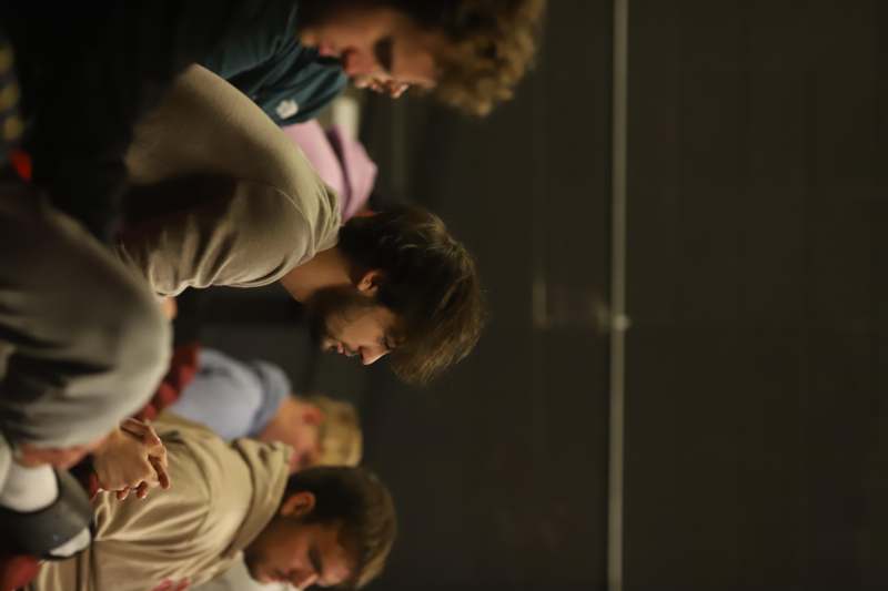 a group of people sitting in a room