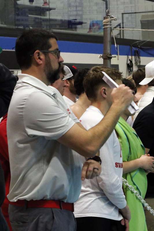 a group of people standing in a room