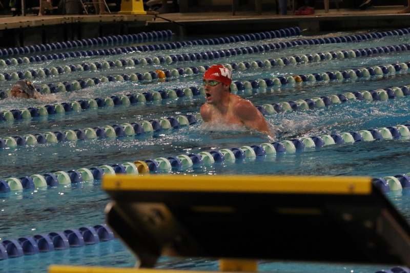 a man in a swimming pool