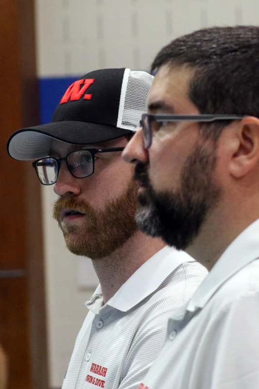 a group of men in glasses