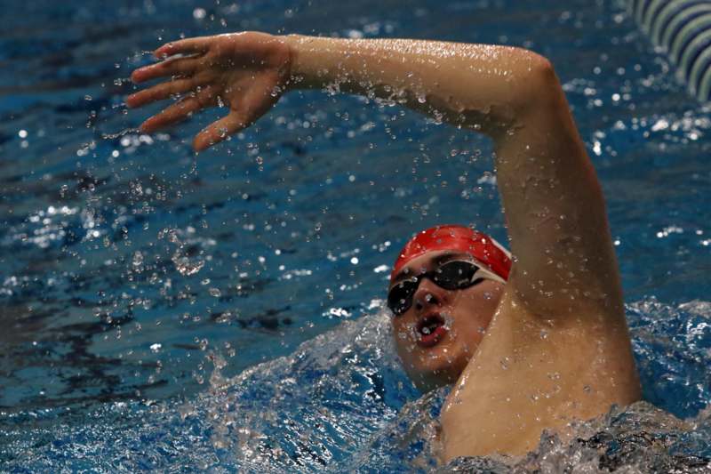 a man in a swimming pool