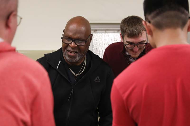 a man in a black jacket