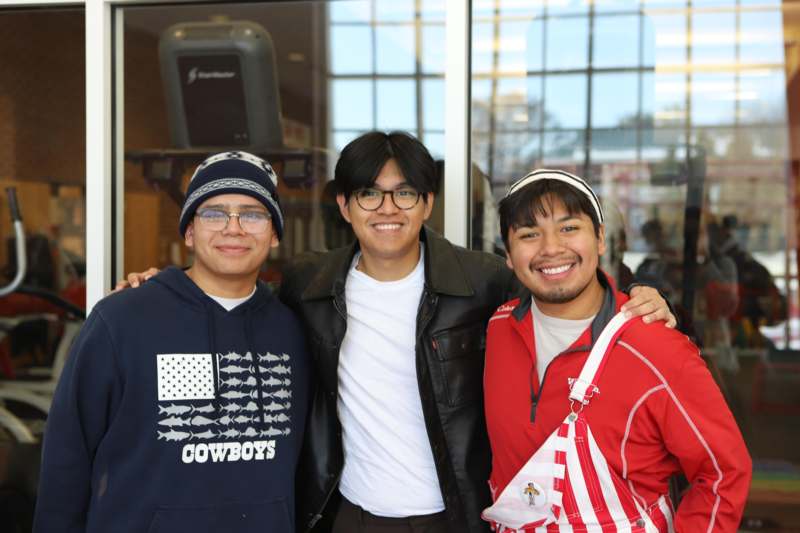 Scarlet Honors 2025 - a group of men standing together smiling