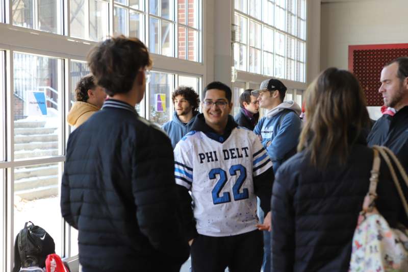 a group of people in a hallway