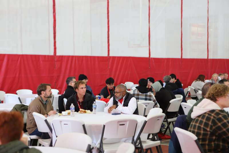 a group of people sitting at a table