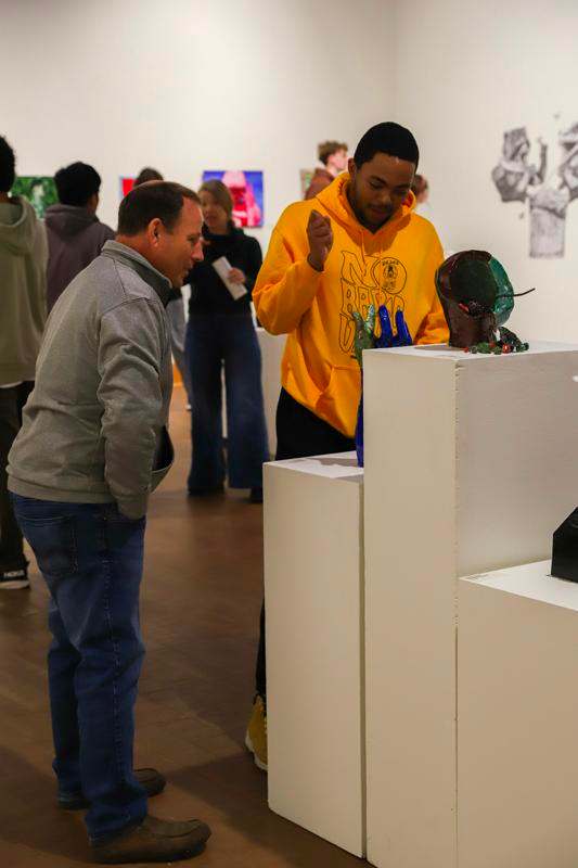 a group of people in a museum