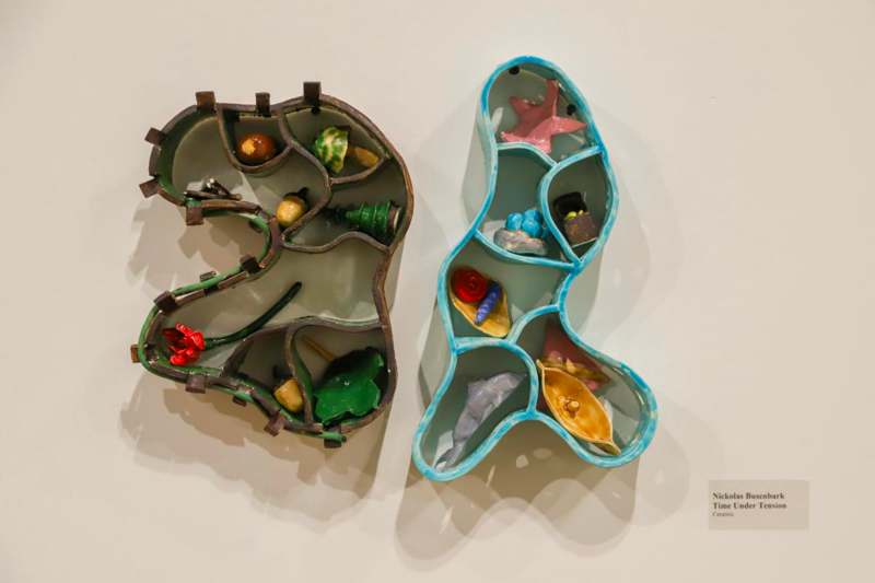 a shelf with different shapes and colors