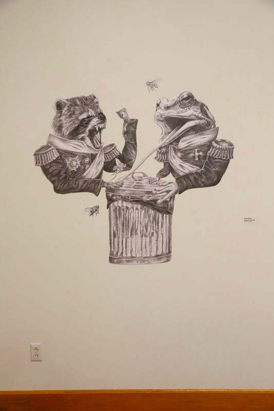 a drawing of a frog and raccoon