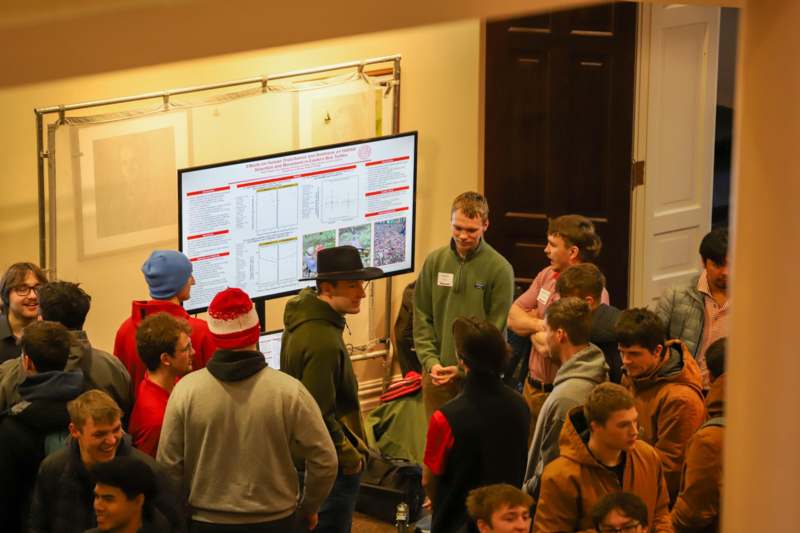 a group of people standing in a room