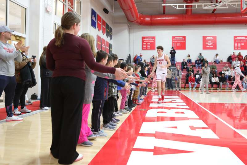 a group of people in a gym