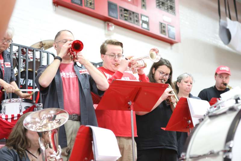 a group of people playing instruments