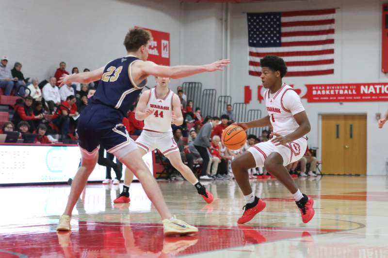 a group of men playing basketball