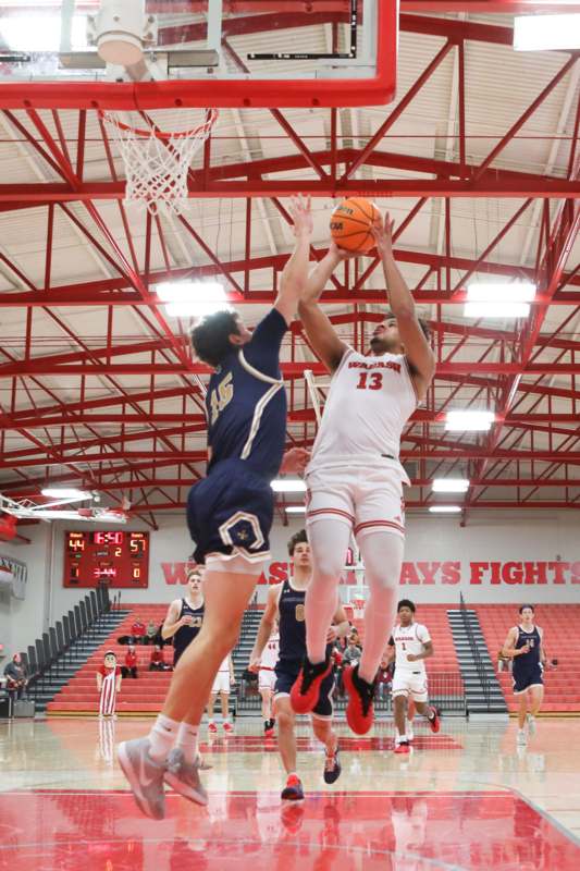 a basketball player in a gym