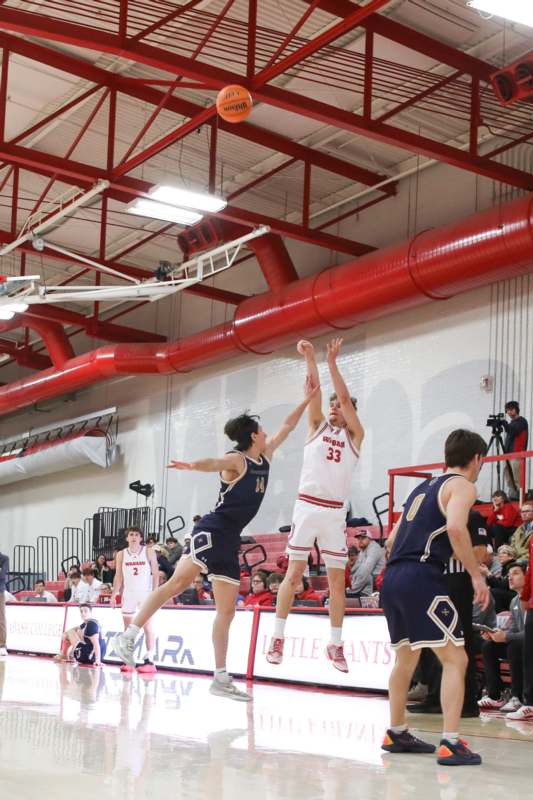 a group of people playing basketball