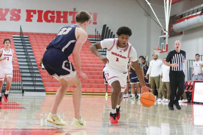 a basketball player dribbling a basketball