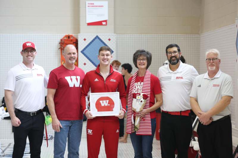 a group of people posing for a photo