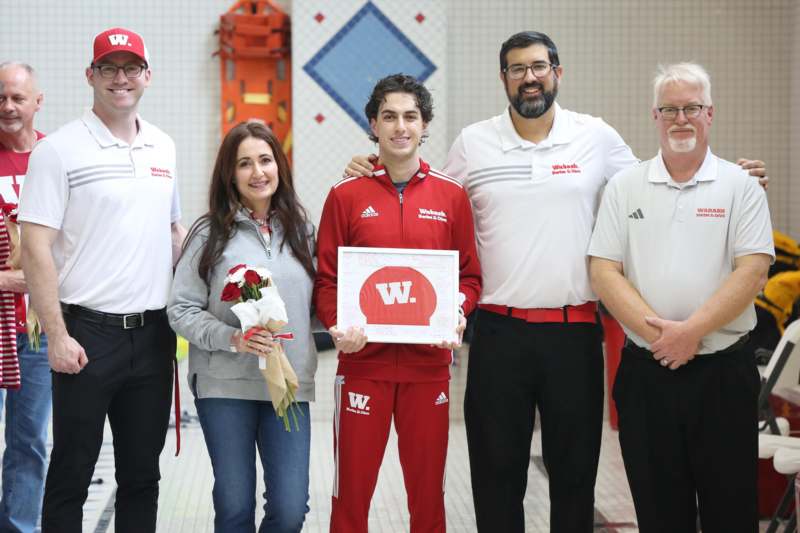 a group of people posing for a photo