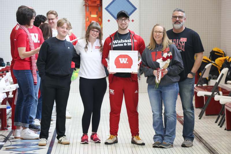 a group of people posing for a photo