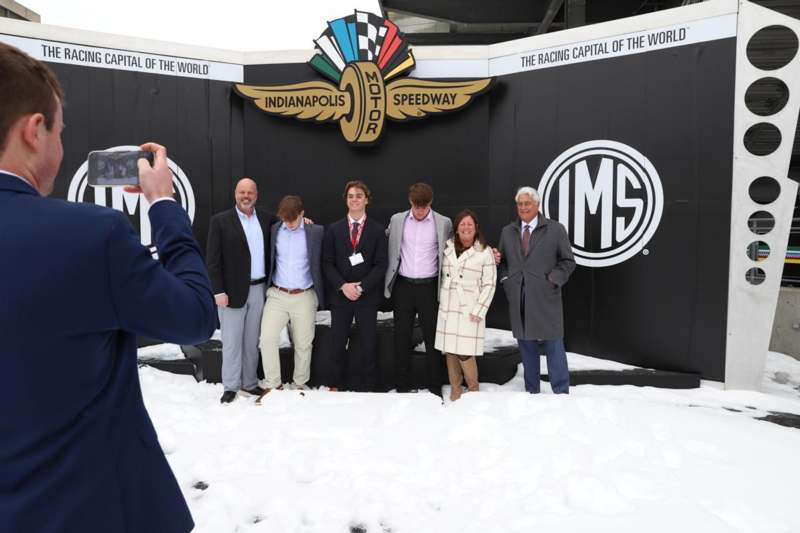 a group of people posing for a photo