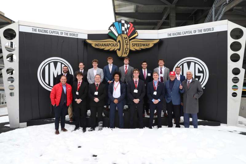 a group of people posing for a photo