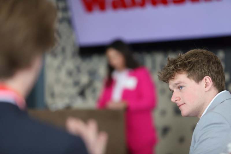 a man looking at another man