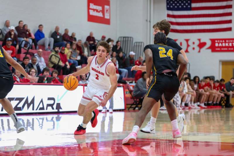 a group of people playing basketball