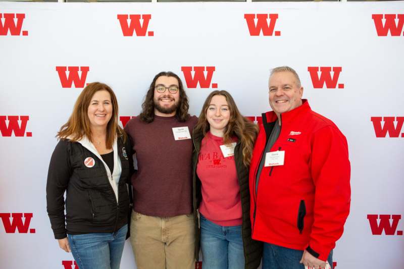 a group of people posing for a photo