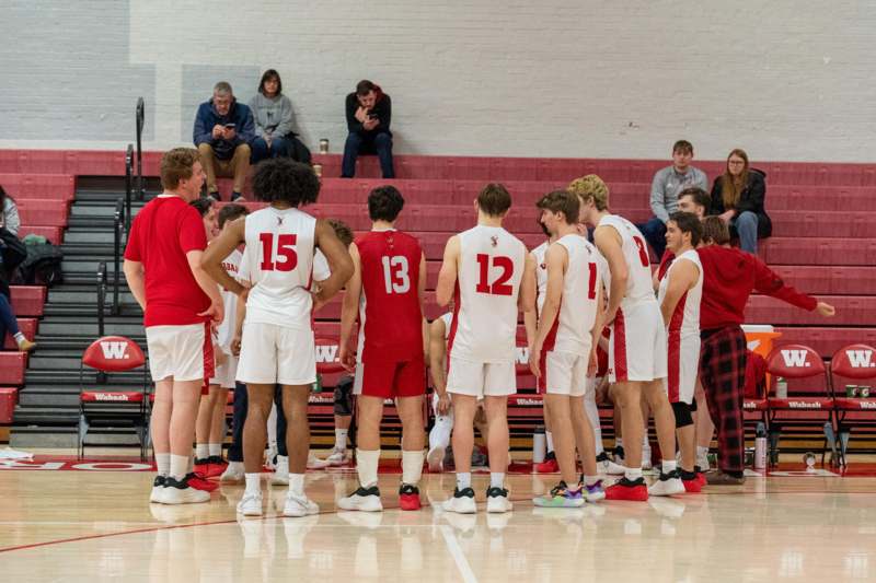 a group of people in a basketball game