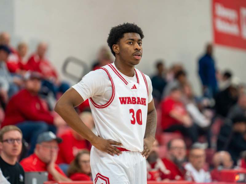 a man in a basketball uniform