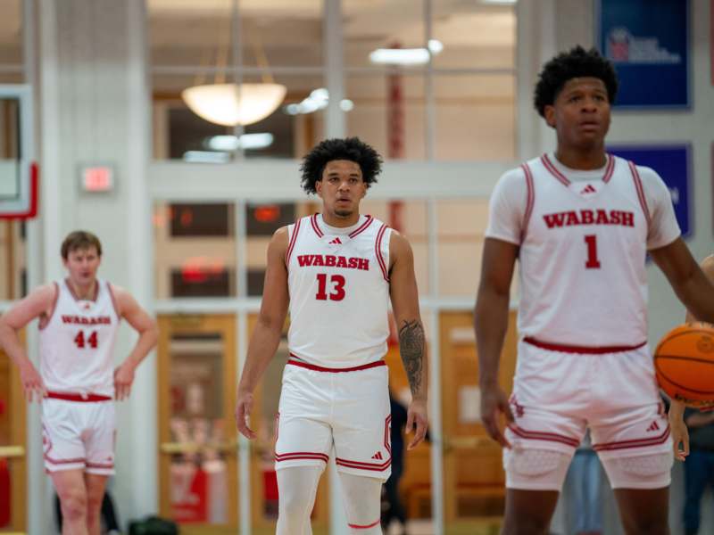 a group of men in basketball uniforms