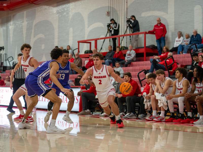 a group of people playing basketball