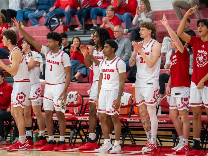 a group of people in sports uniforms
