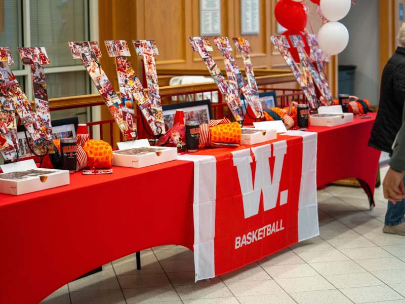 a table with red and white decorations