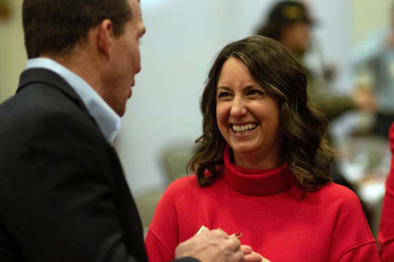 a man and woman smiling