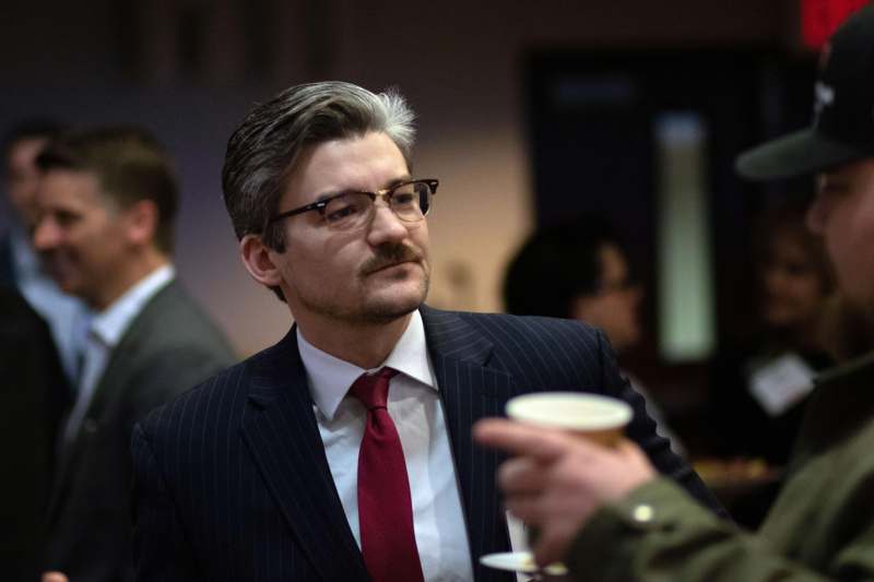 a man in a suit and tie