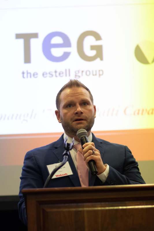 a man speaking into a microphone