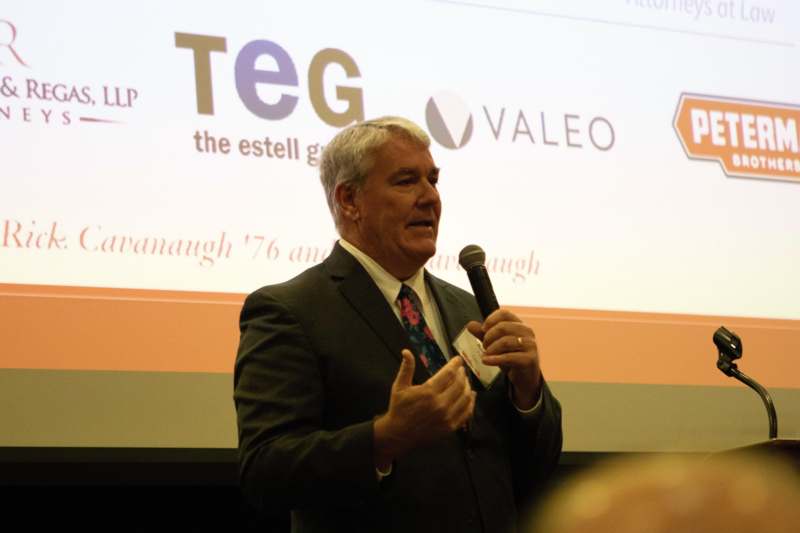 a man giving a thumbs up