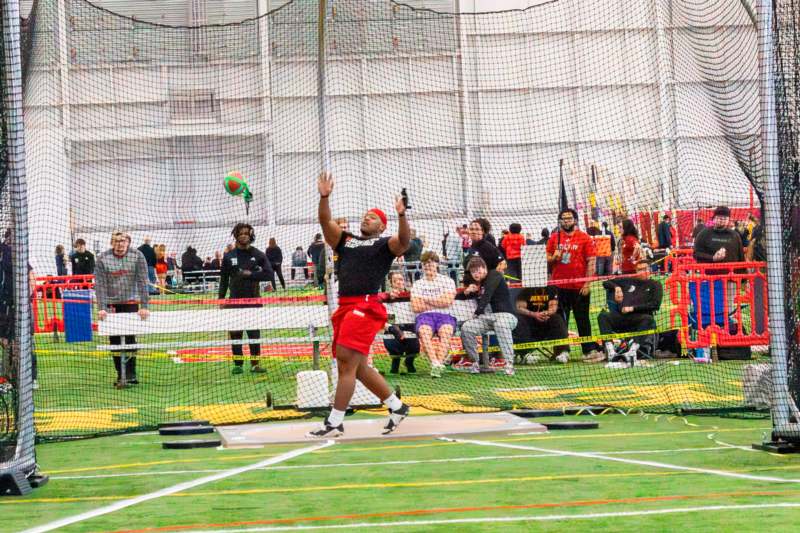 a man throwing a ball