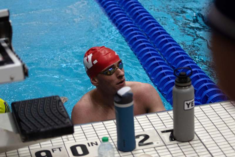 a man in a swimming pool
