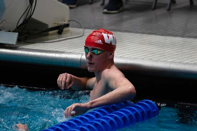 a man in a swimming pool