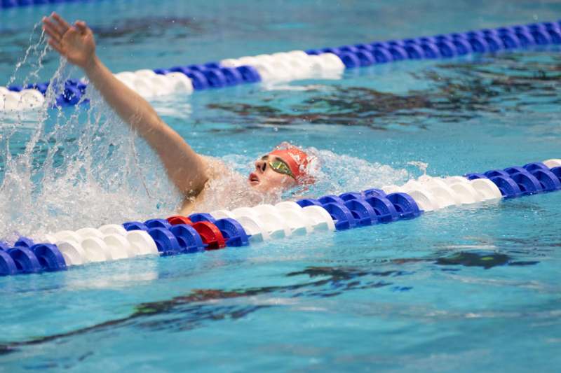 a person swimming in a pool
