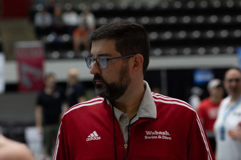 a man in a red jacket