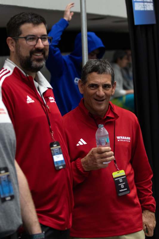a group of men wearing red jackets