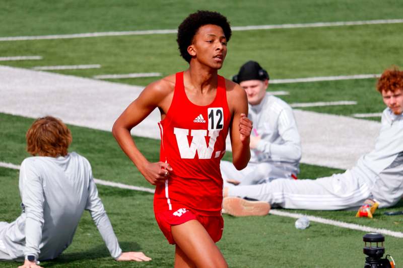 a man running on a track