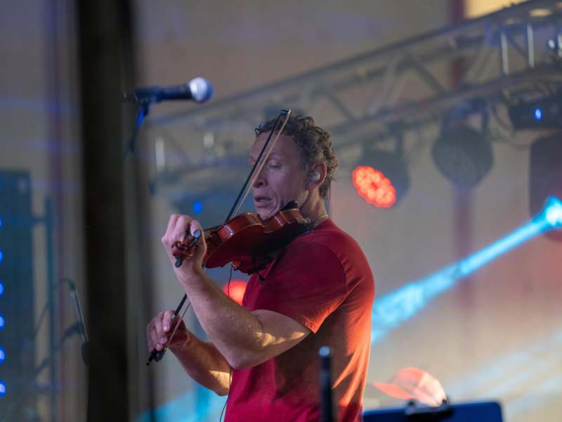 a man playing a violin