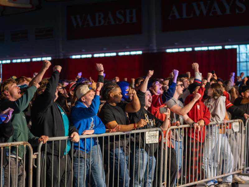 a group of people standing in a crowd