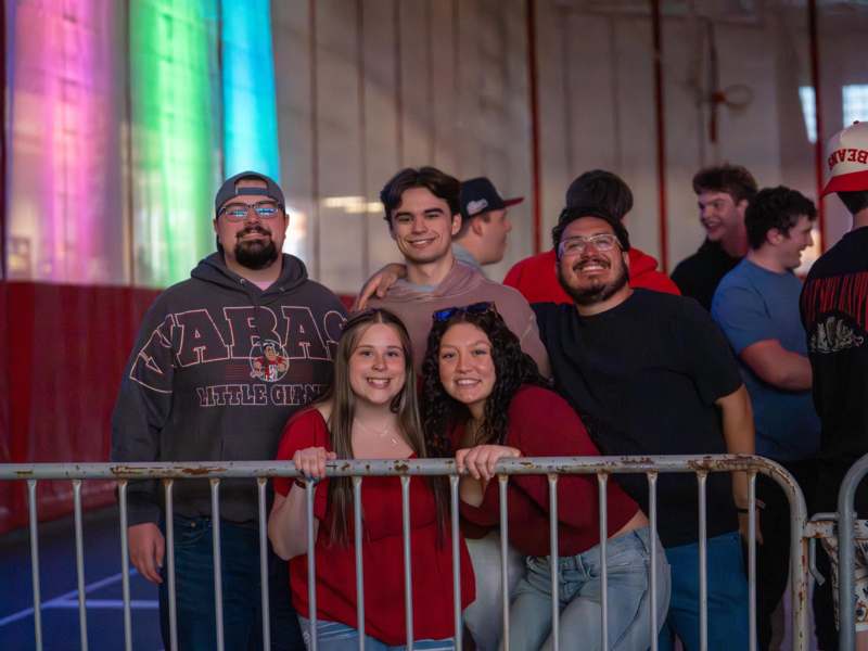 a group of people posing for a photo